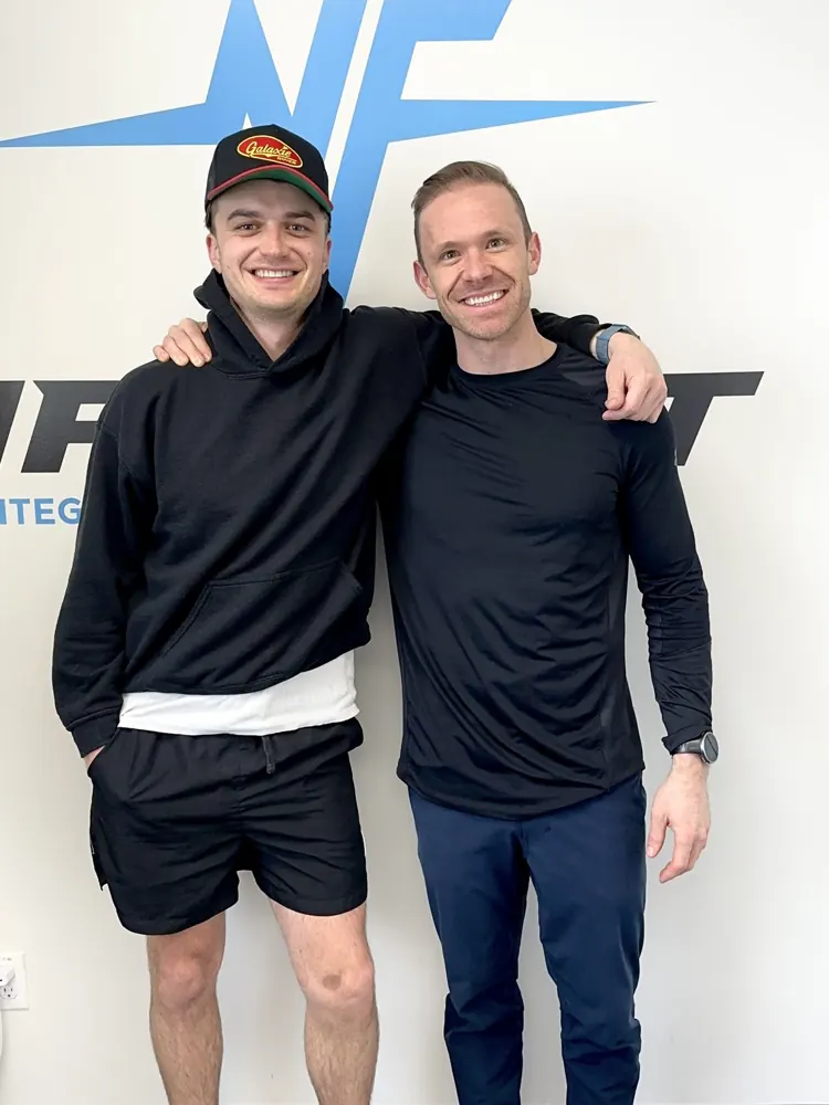 Nathaniel Ernst with actor and musician Joe Keery at the NATEFIT studio in Calgary